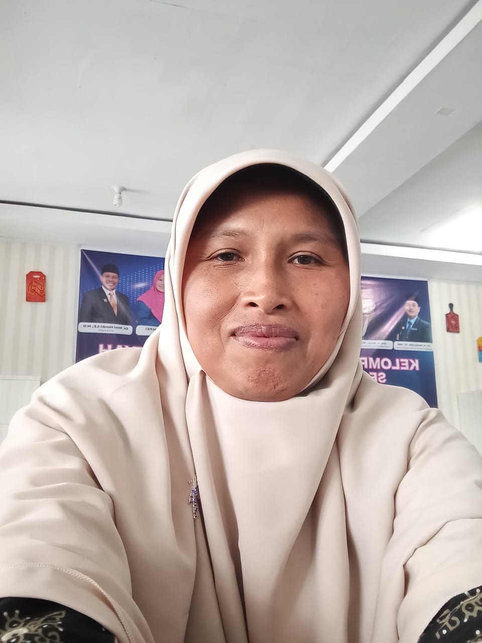 Elfa Warni, S.Pd.I